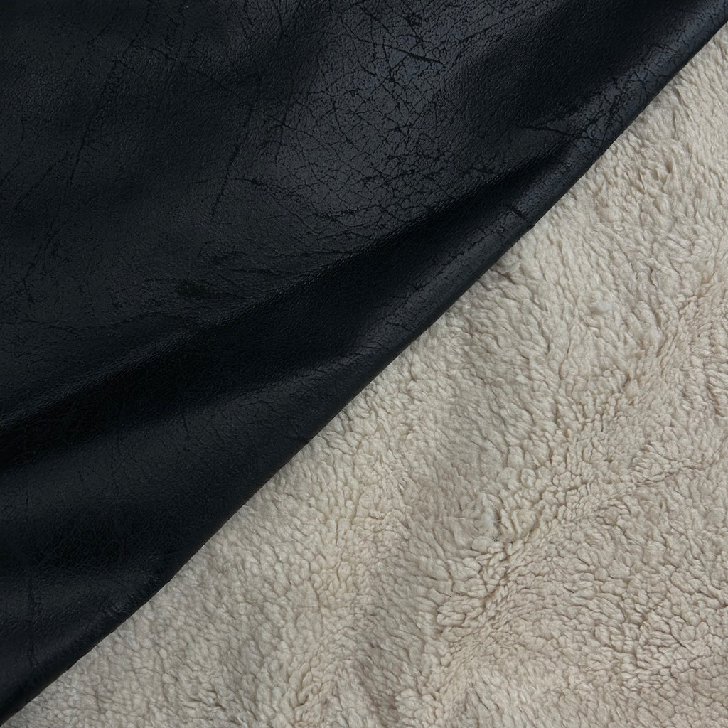 Black waterproof faux leather with a vintage crackle effect